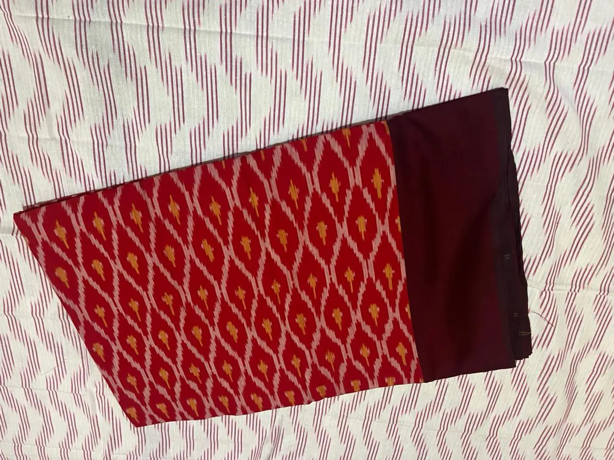 Product image: red and maroon folded saree-like textile