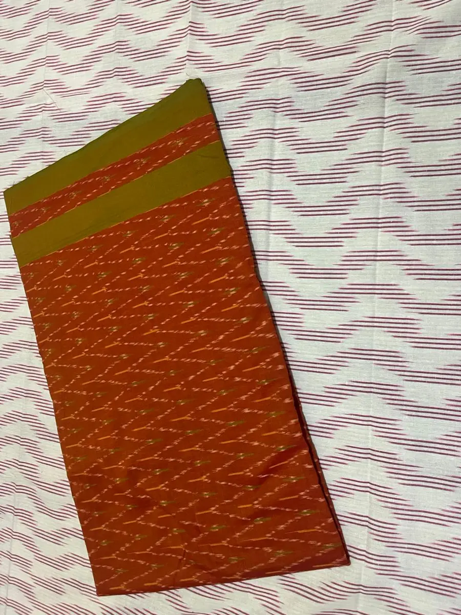 Product image: orange, red, and green folded saree-like textile