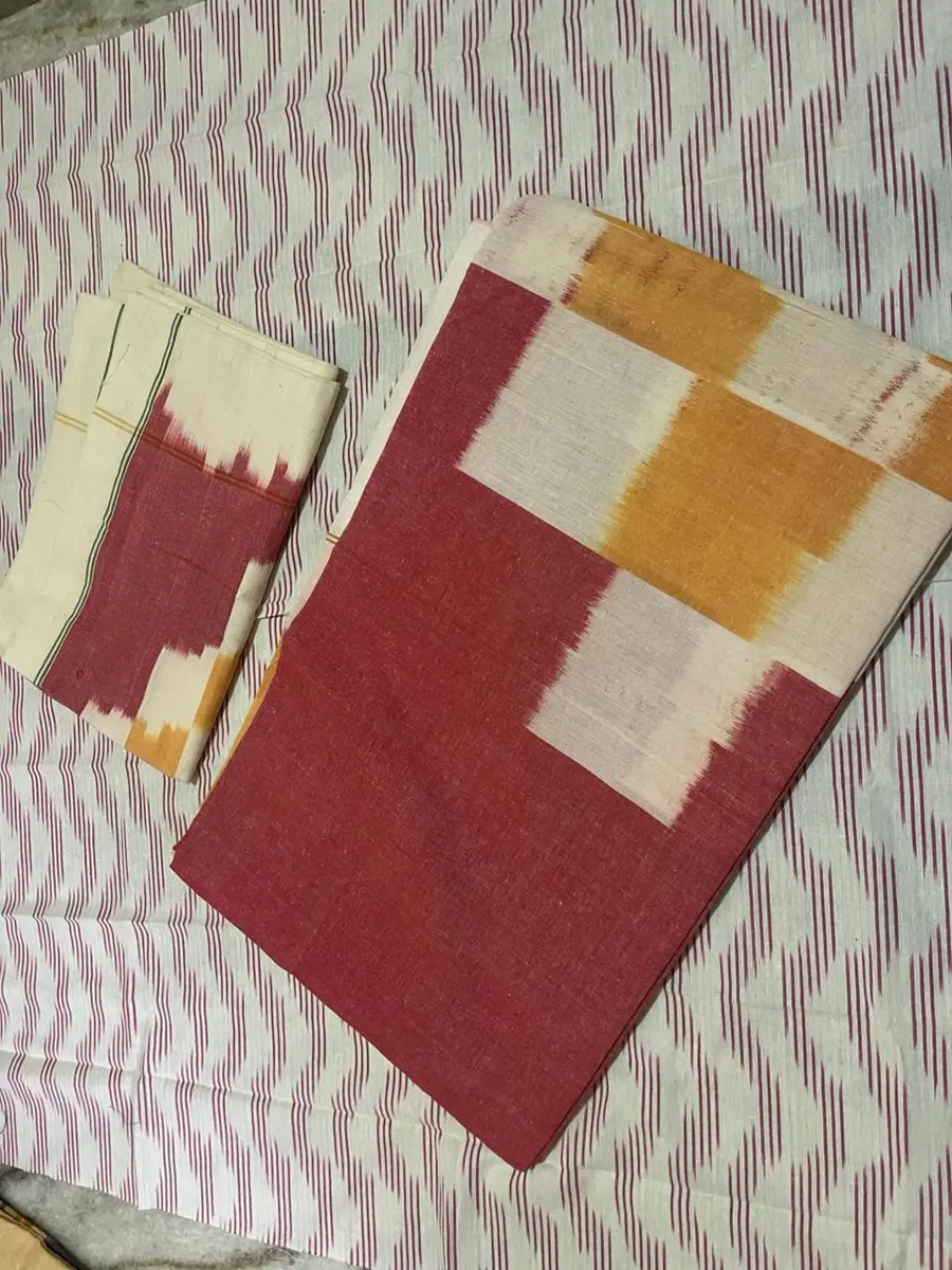 Product image: cream, red, and mustard folded saree-like textile