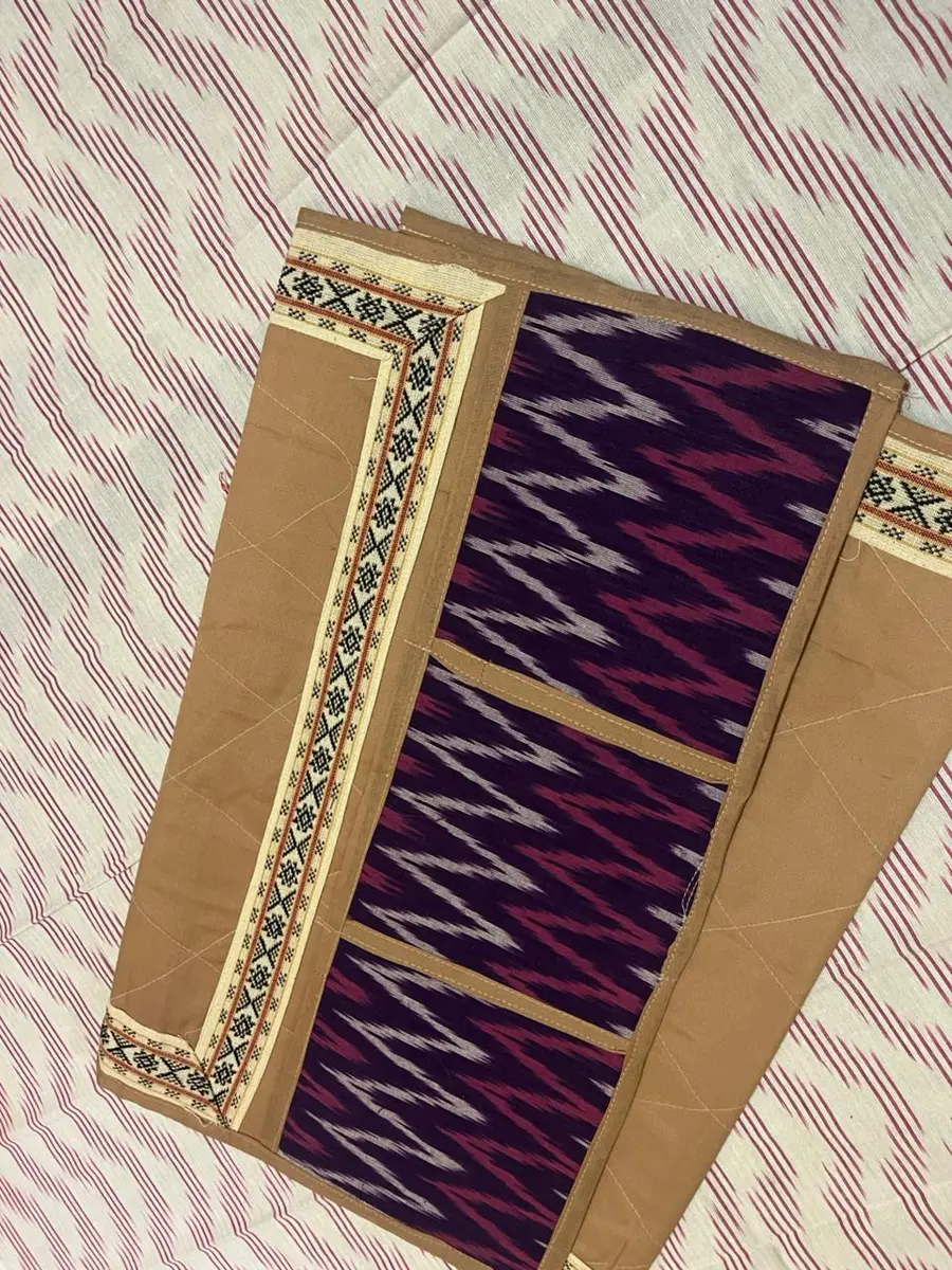Product image: purple, gold, and tan folded saree-like textile
