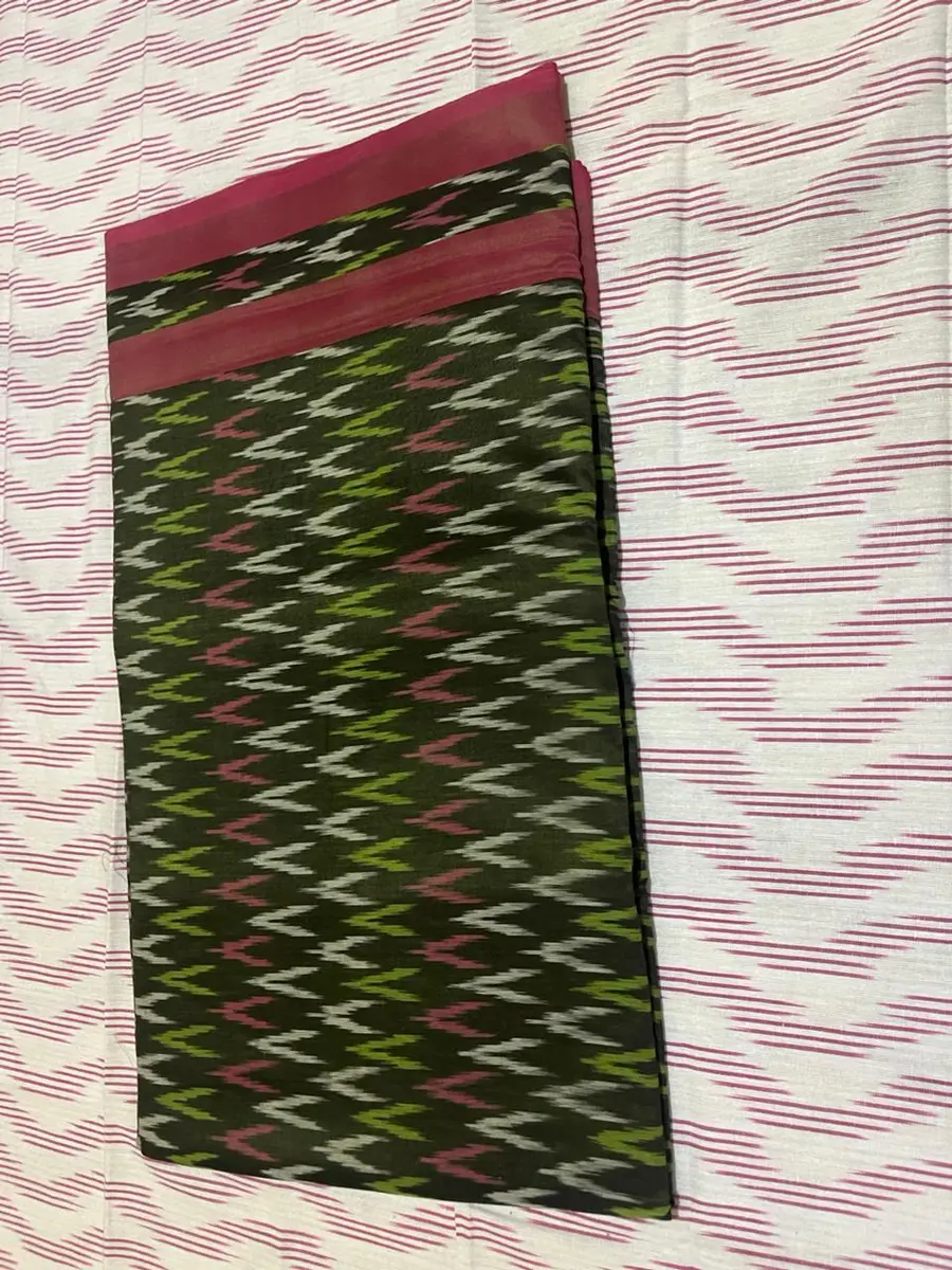 Product image: green, black, and red folded saree-like textile
