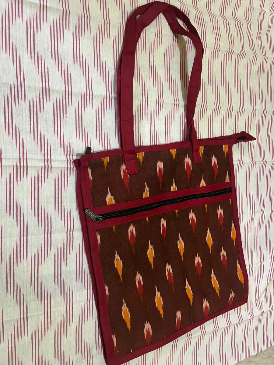 Product image: brown and orange handbag