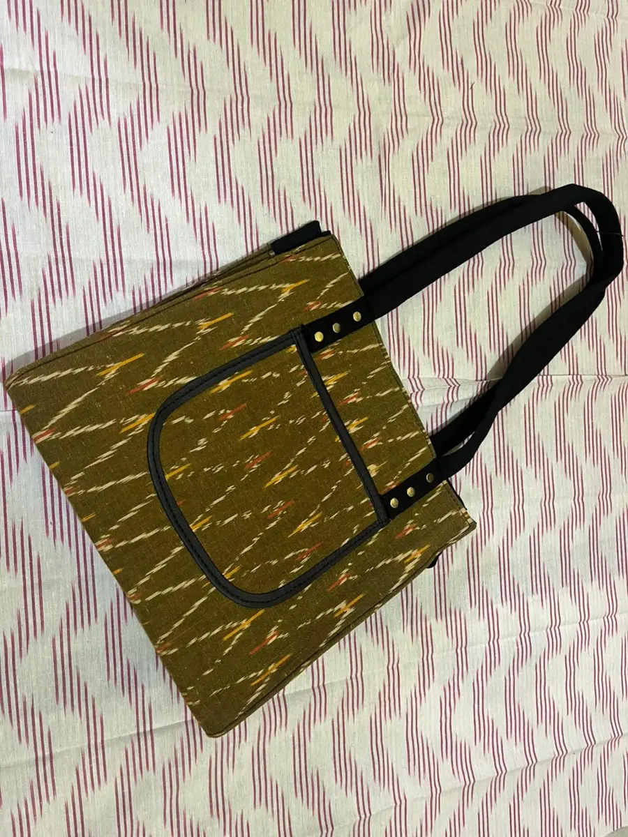 Product image: olive and black handbag