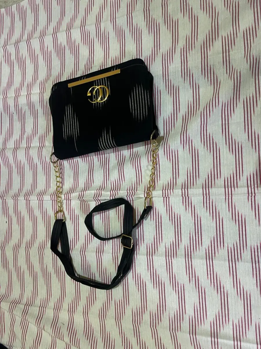 Product image: black and brown handbag