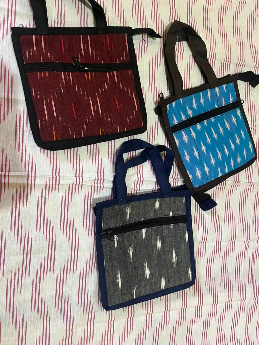 Product image: red, blue, black, and gray assorted small handbags
