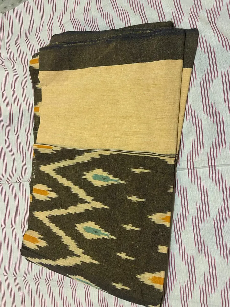 Product image: mustard, black, and cream folded saree-like textile