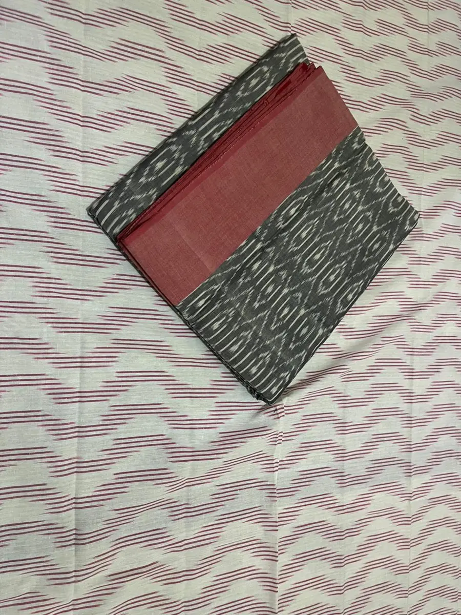 Product image: gray, red, and black folded saree-like textile