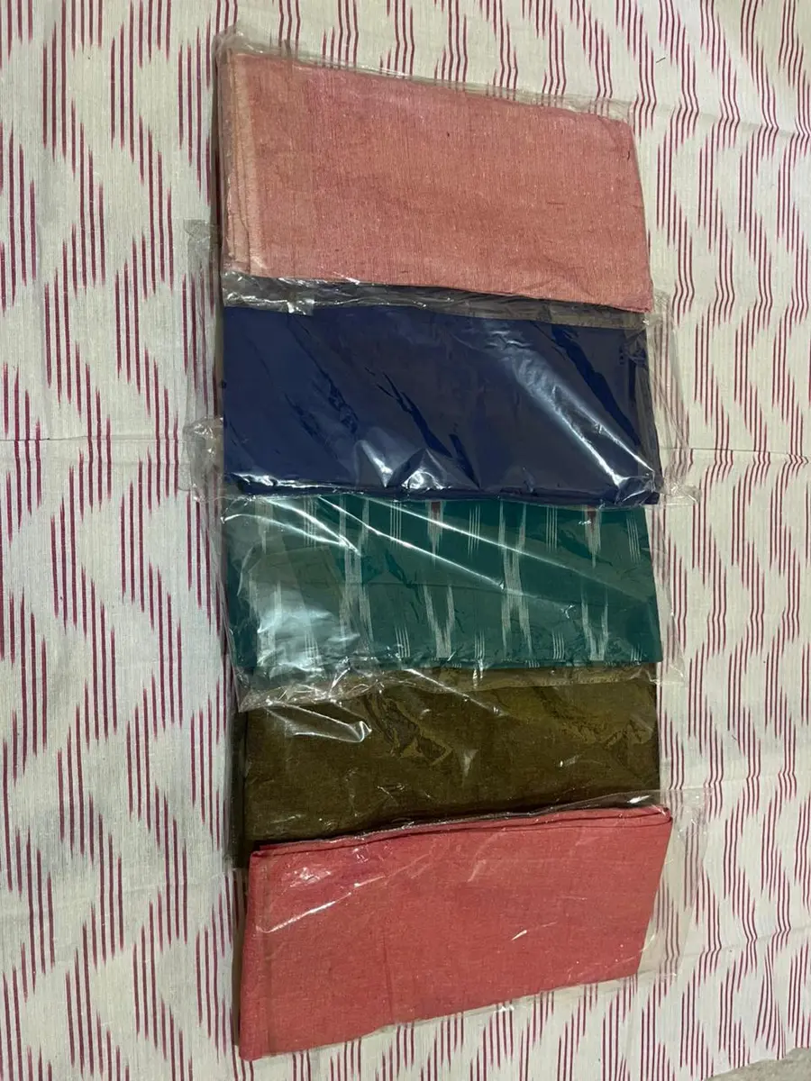 Product image: pink, navy, teal, olive, and red stack of folded textile items