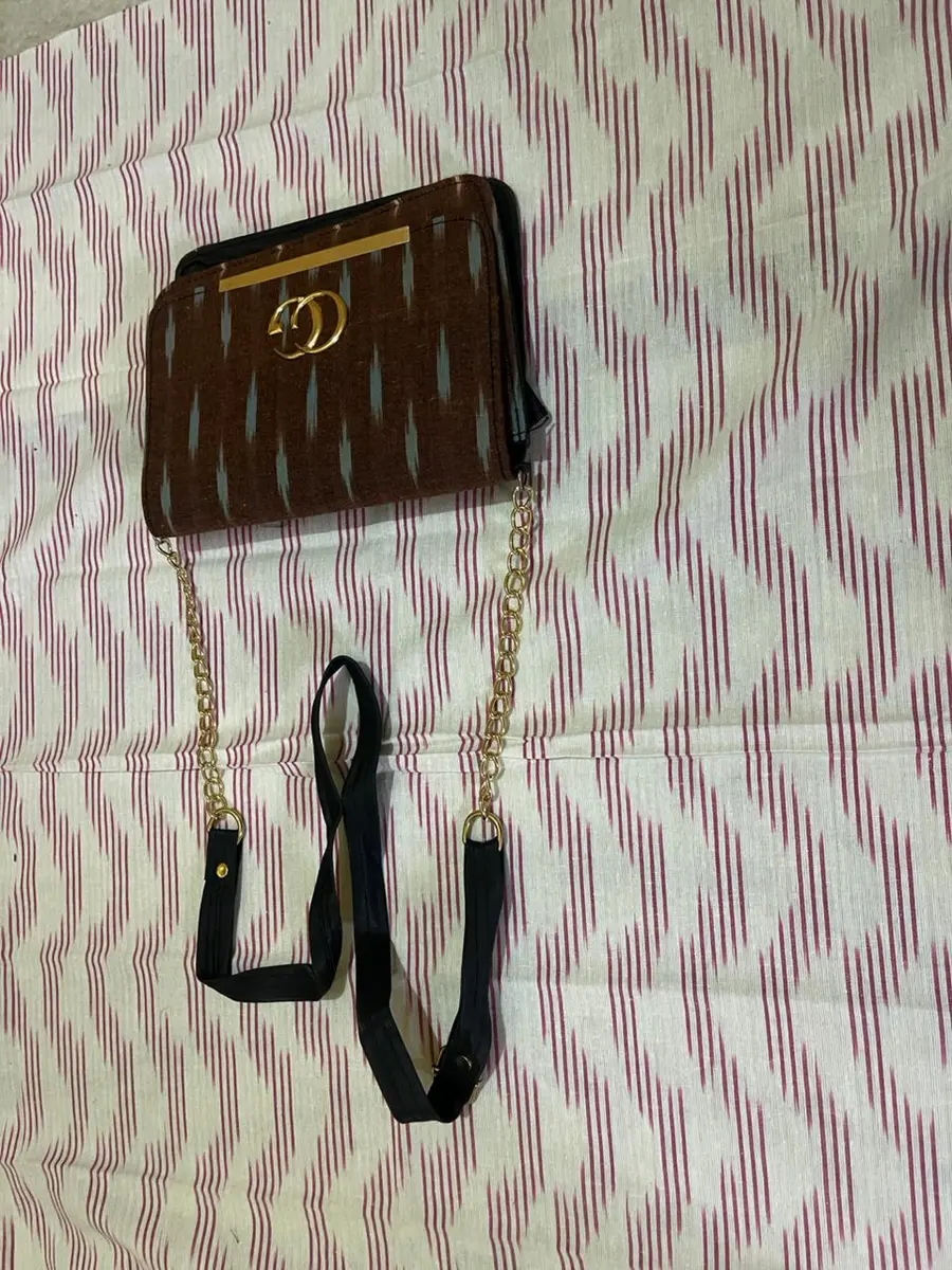 Product image: brown and black handbag