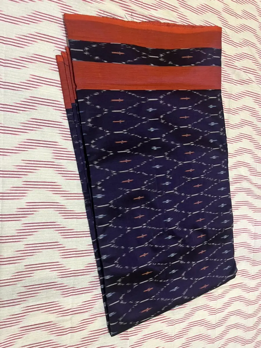 Product image: navy blue, purple, and red folded saree-like textile