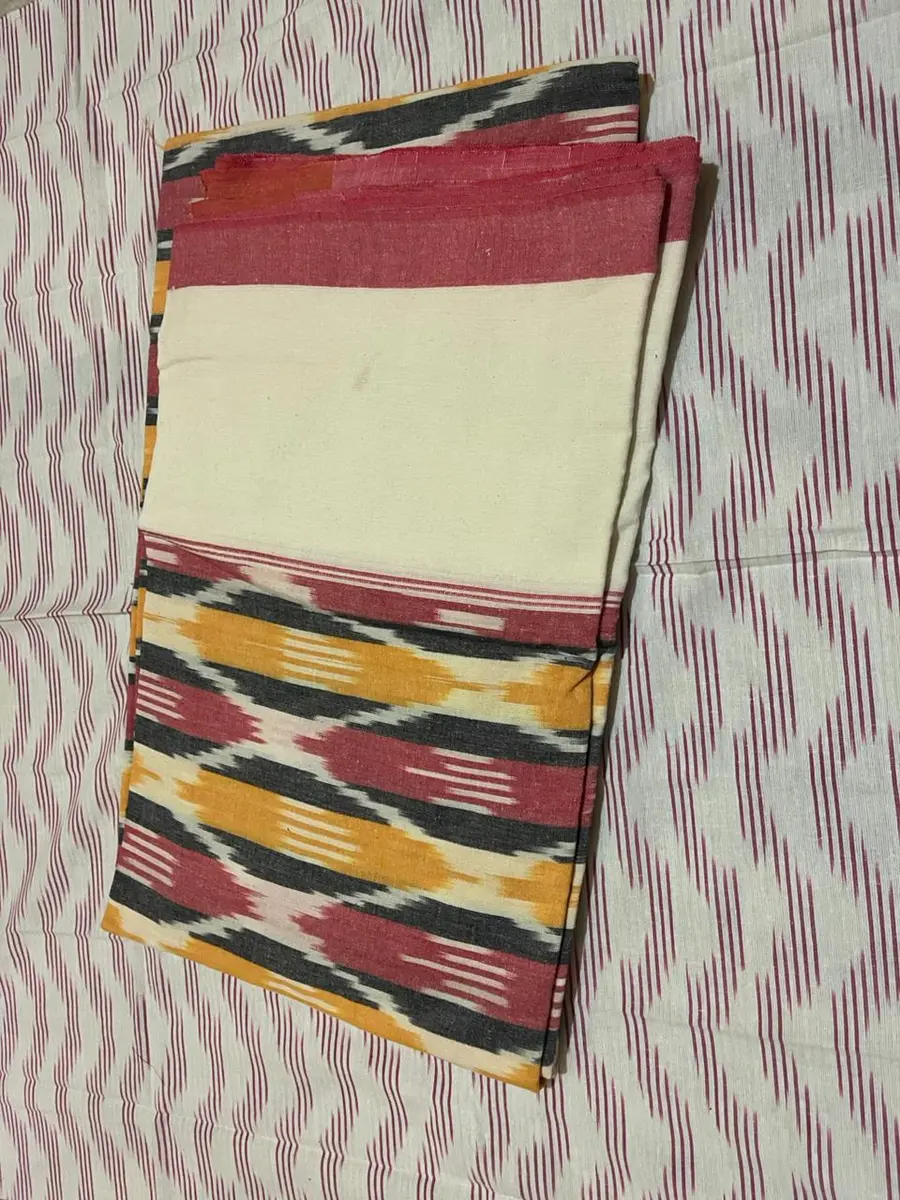 Product image: cream, red, blue, and mustard folded saree-like textile