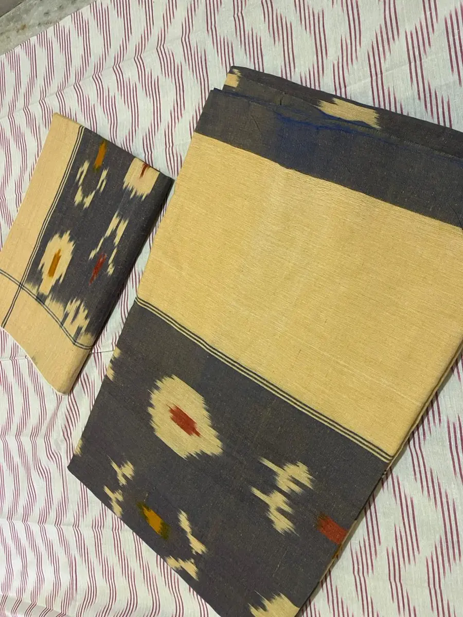 Product image: cream, blue, mustard, and brown folded saree-like textile