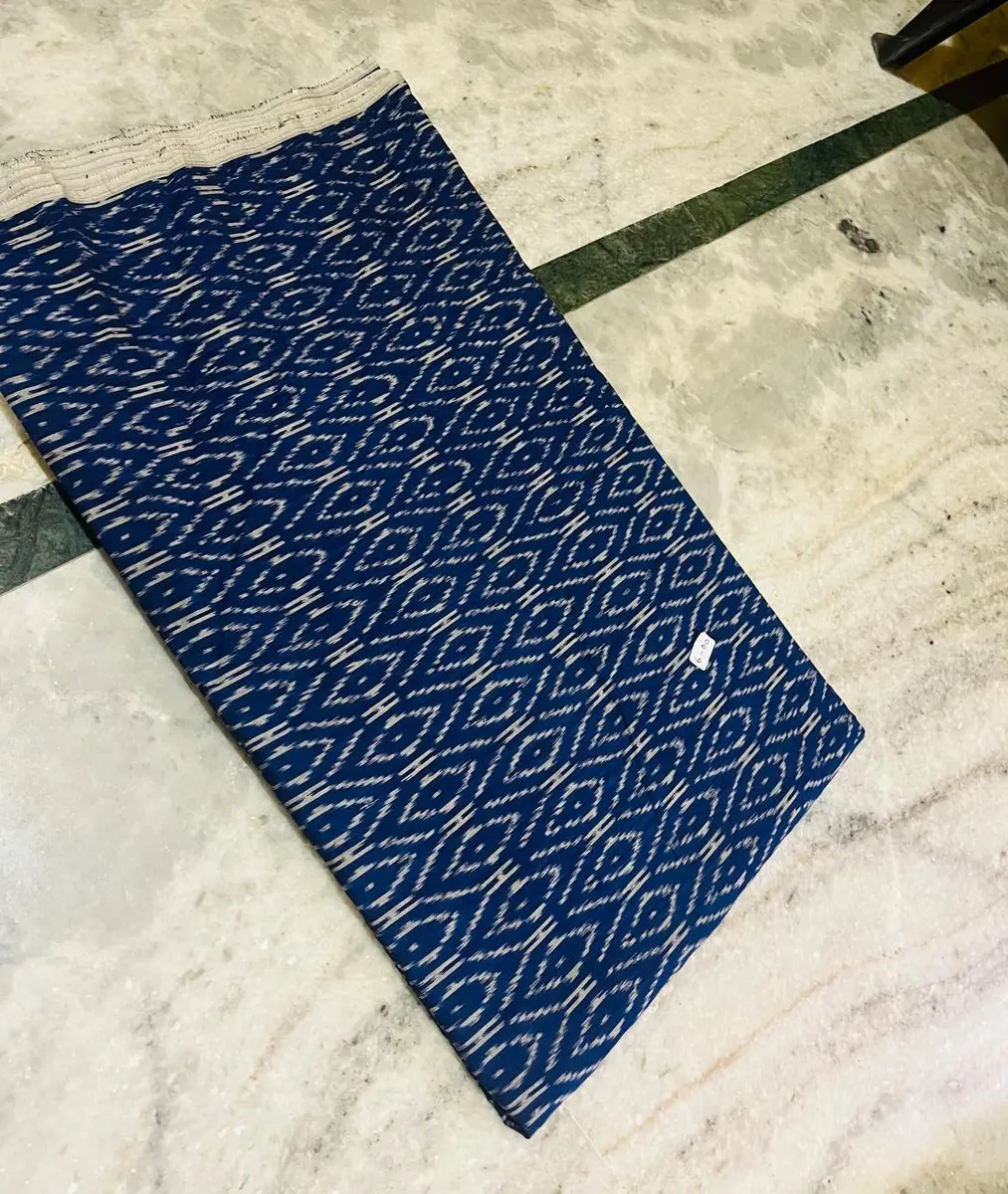 Product image: navy blue and cream folded saree-like textile