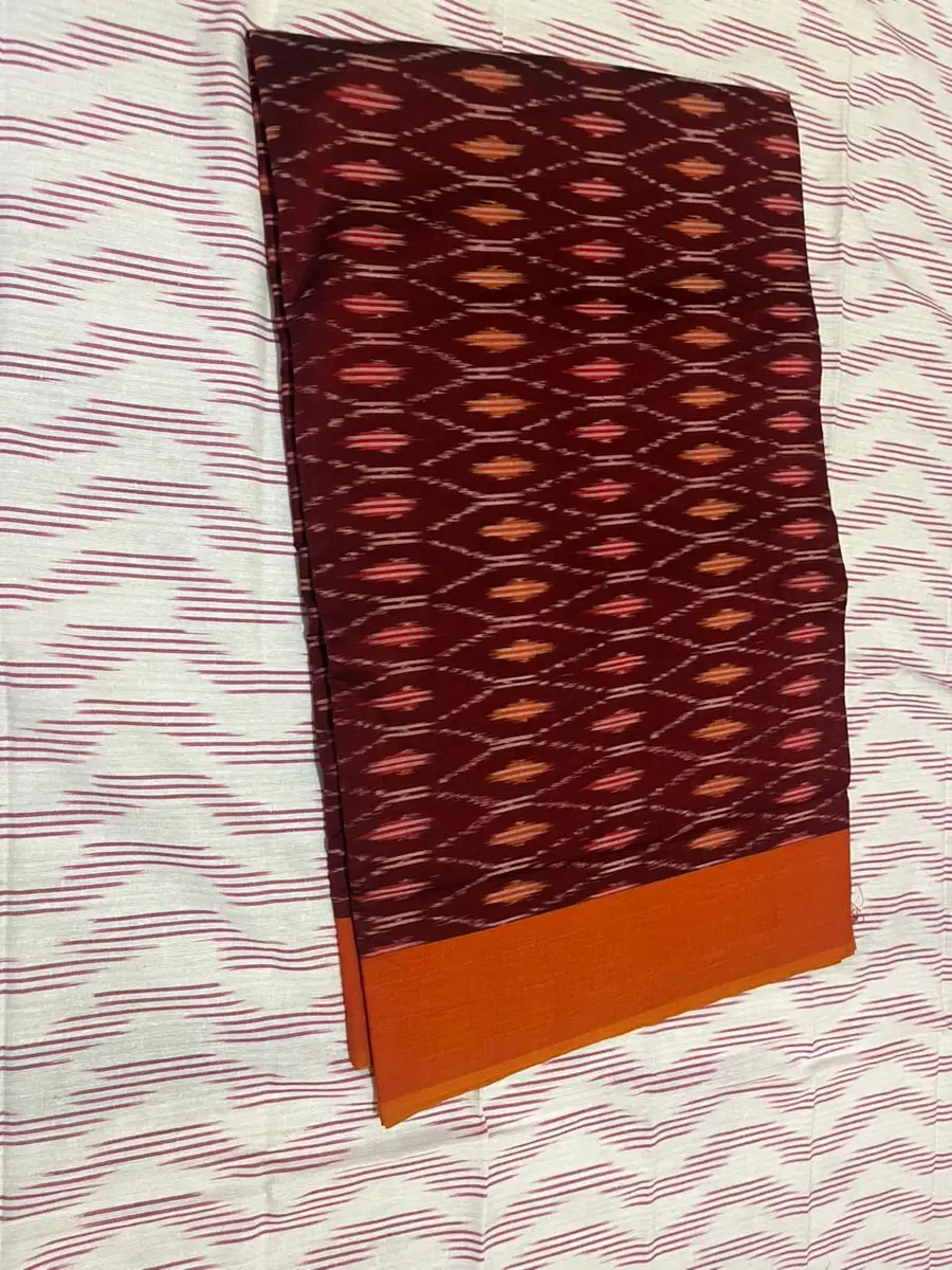Product image: maroon and orange folded saree-like textile