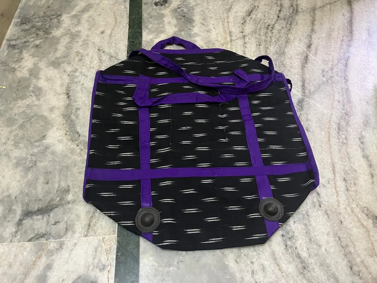 Product image: black and purple handbag