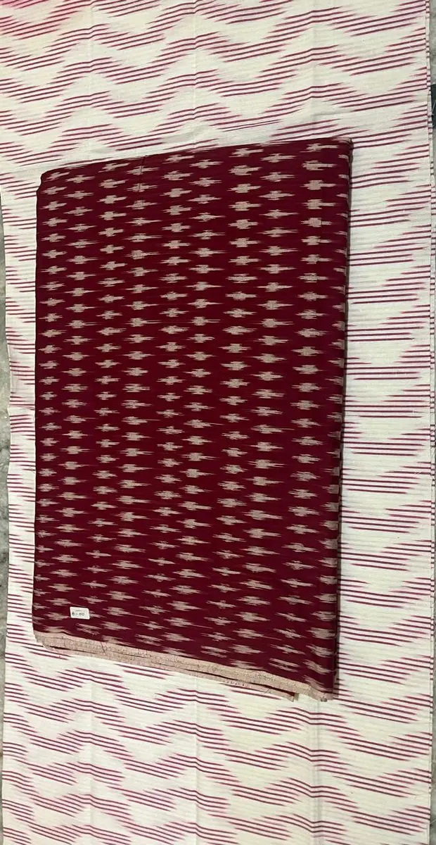 Product image: maroon and cream folded saree-like textile