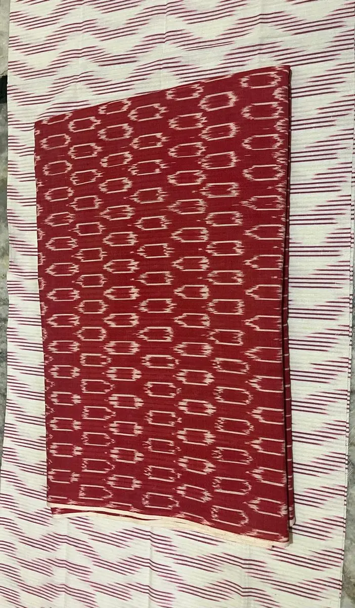 Product image: red and cream folded saree-like textile